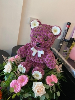3D Sitting Bear on Bed of Flowers