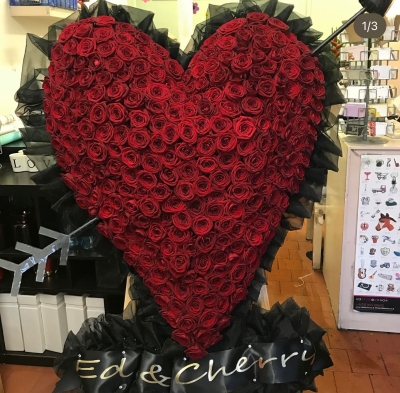 Red rose heart on a stand