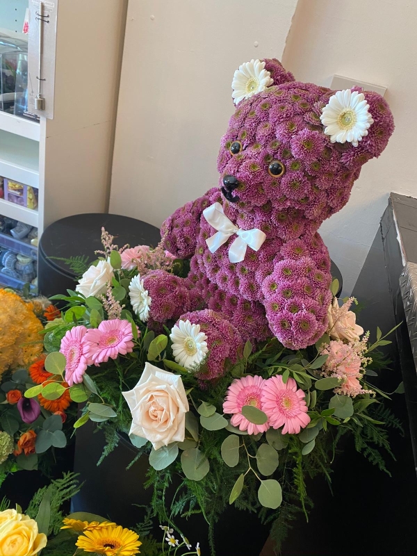 3D Sitting Bear on Bed of Flowers